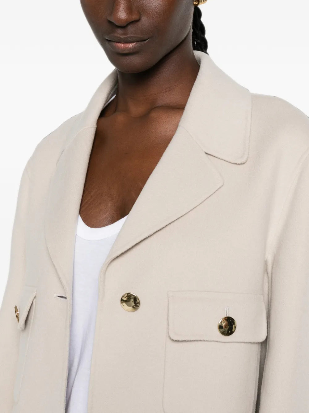 Jacket with chest pocket and button closure