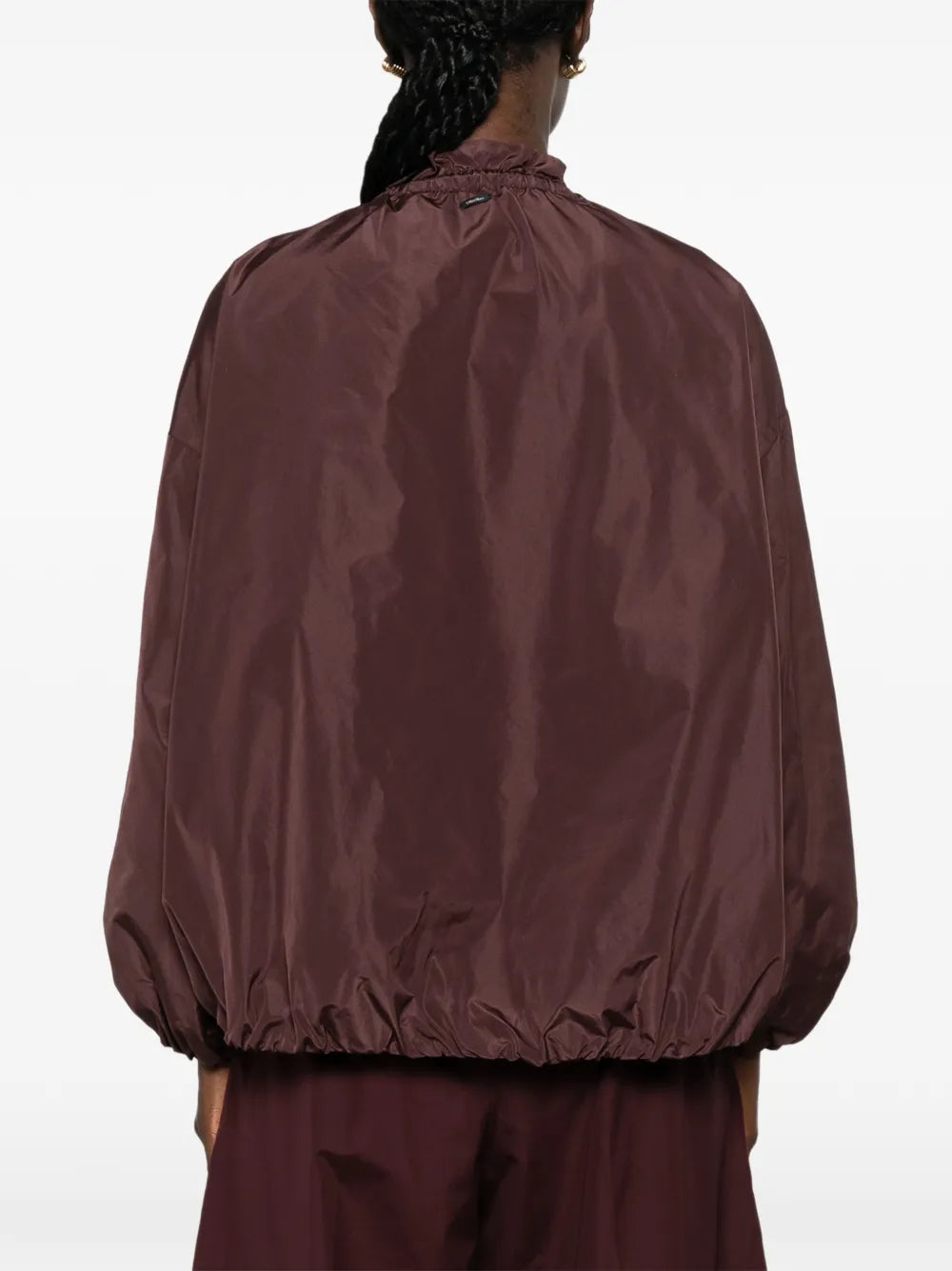 Jacket with ruffles and drawstring