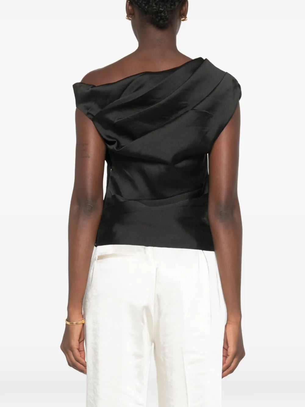Top with asymmetrical neckline and draping