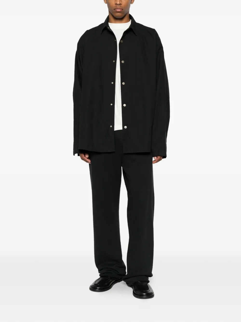 Shirt with snap button closure