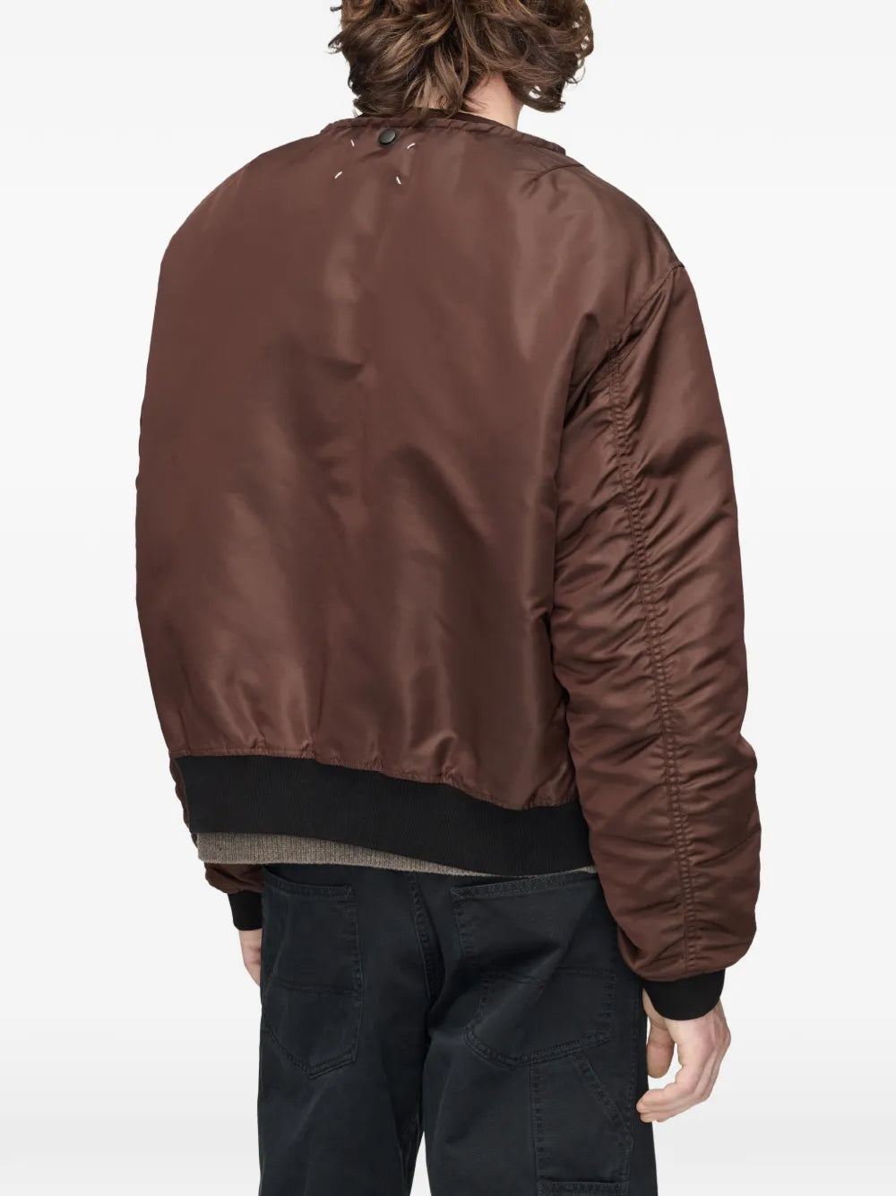 Reversible bomber jacket with decorative stitching