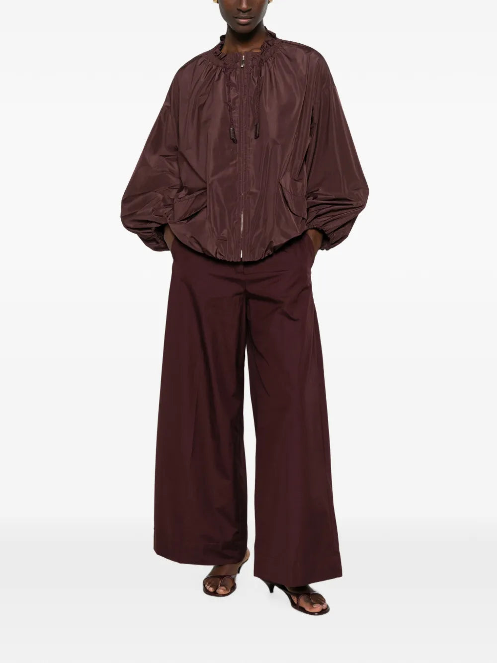 Jacket with ruffles and drawstring